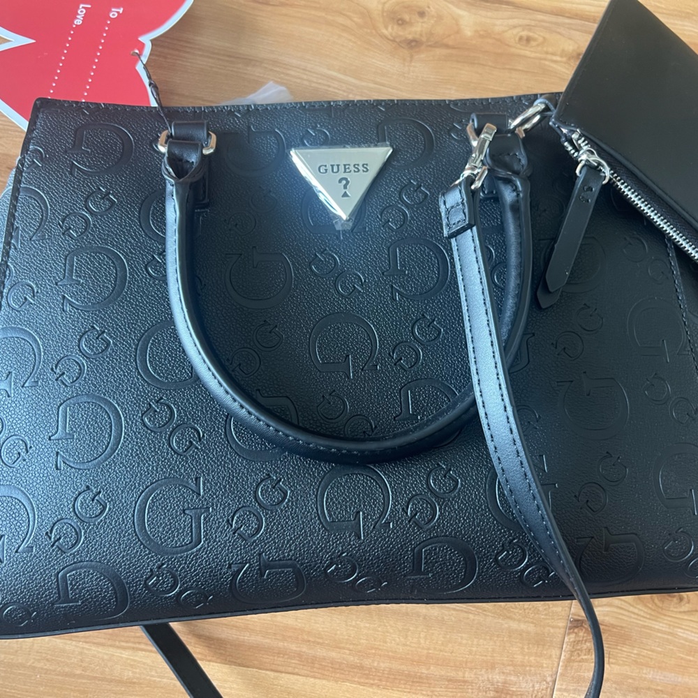 Brand new with tags. Guess purse.